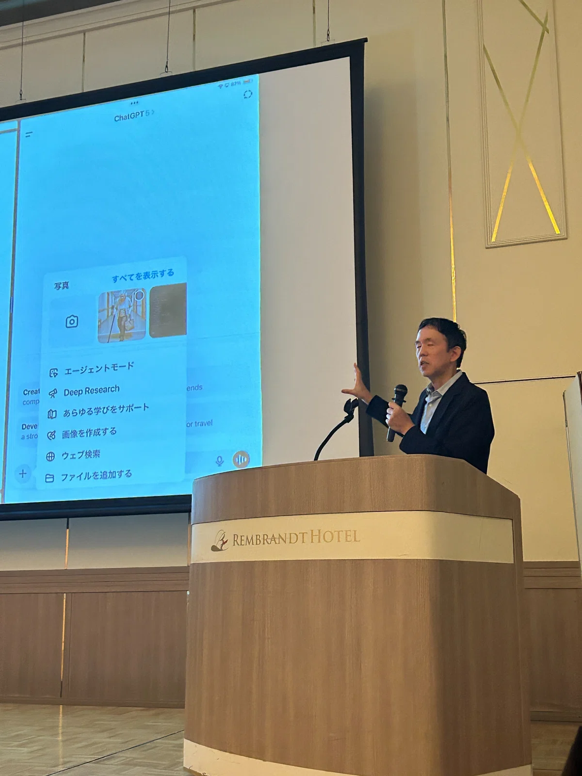 登壇する本郷喜千